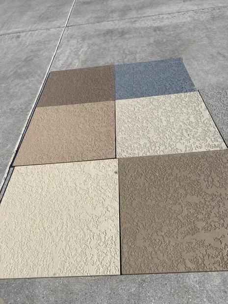 Close view of four textured deck coating samples showing knockdown and orange-peel textures
