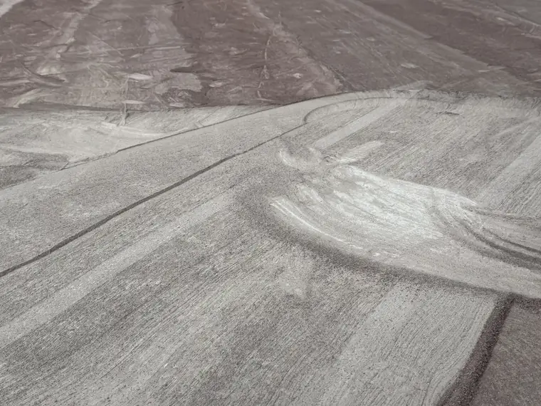 Close view of a ground concrete surface after an old coating was taken off