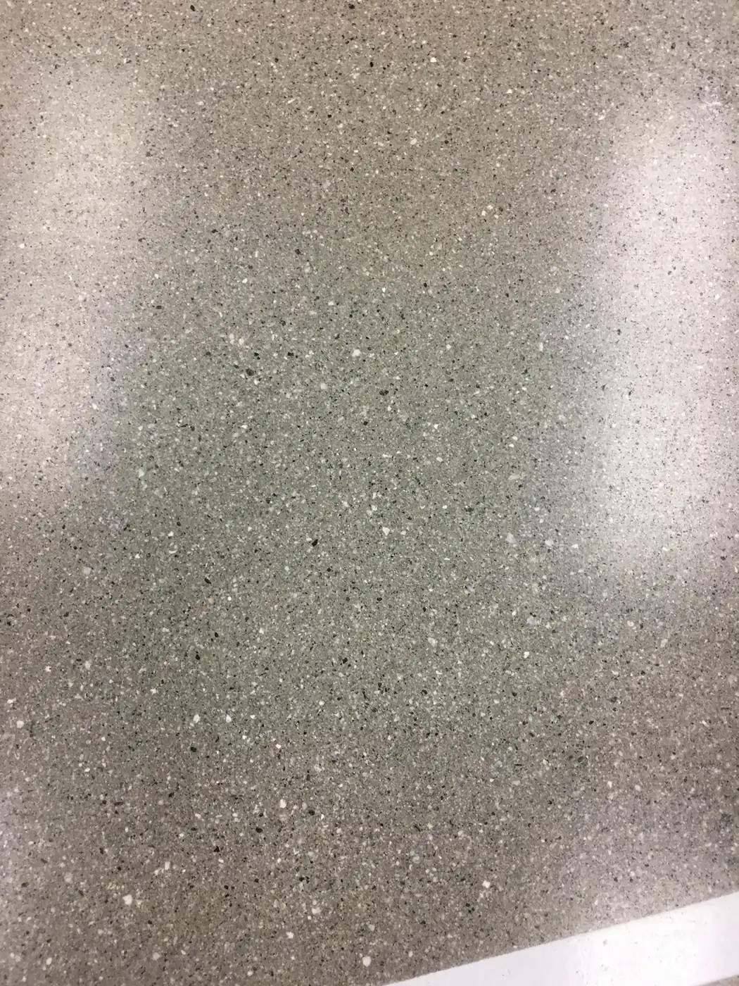 Close view of aggregate exposed in a polished concrete floor